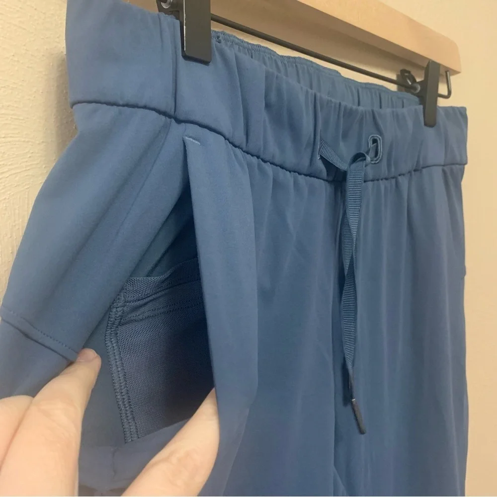 Lululemon On the Fly 7/8 Pant Code Blue Size 4 W5BPNS